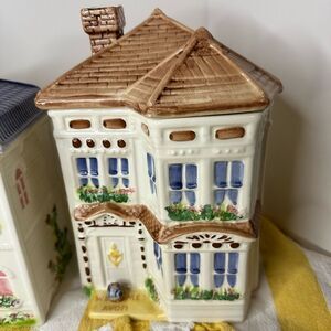Two Vintage Avon Ceramic Townhouse Canisters